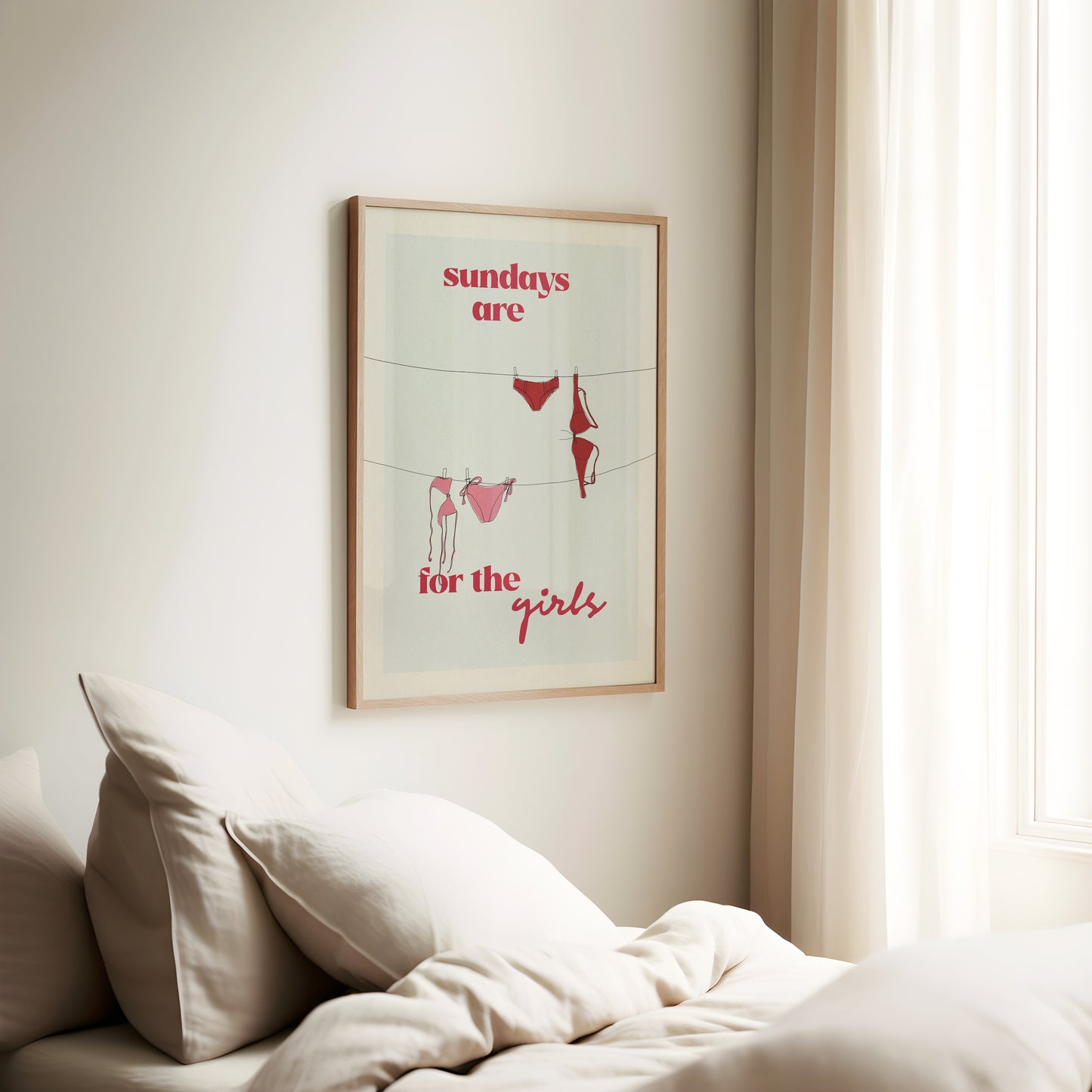 a bed with a white comforter and a picture on the wall