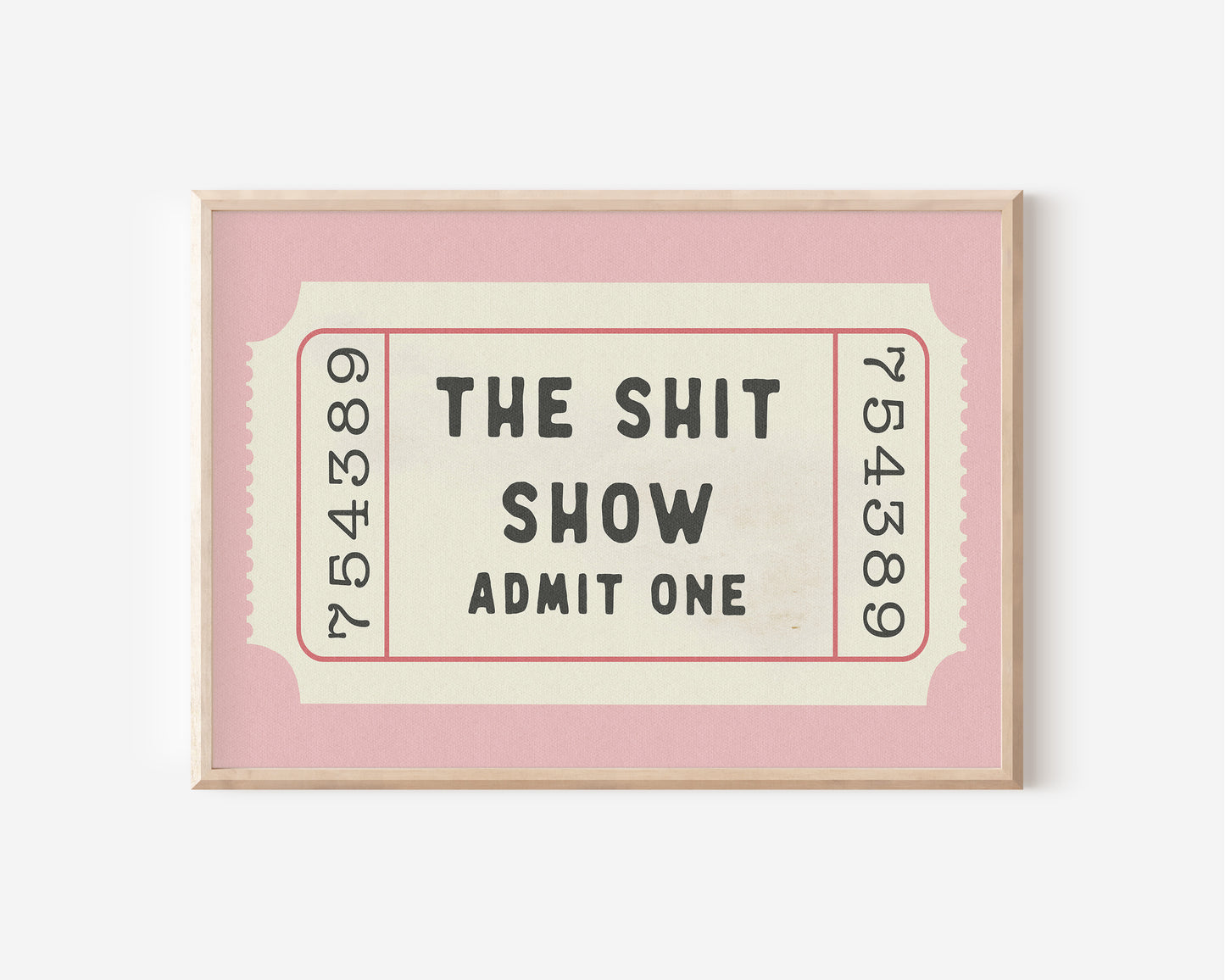 a pink and white ticket with the words, the shit show admit one