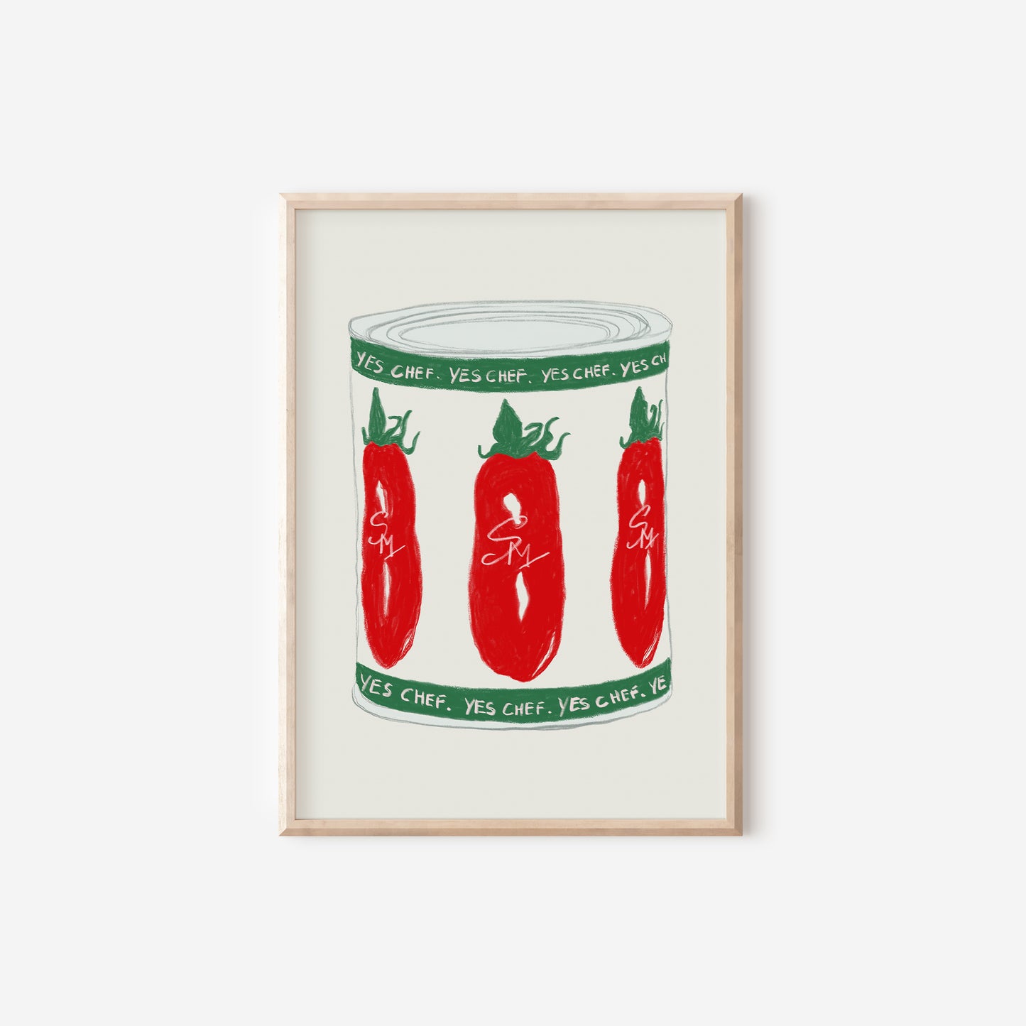 a framed print of three red peppers in a jar