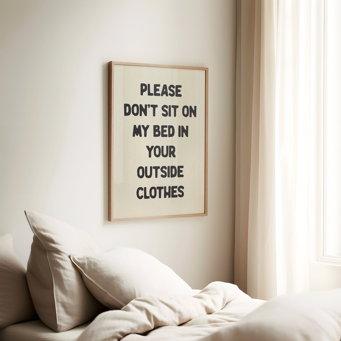a picture of a bed with a white comforter