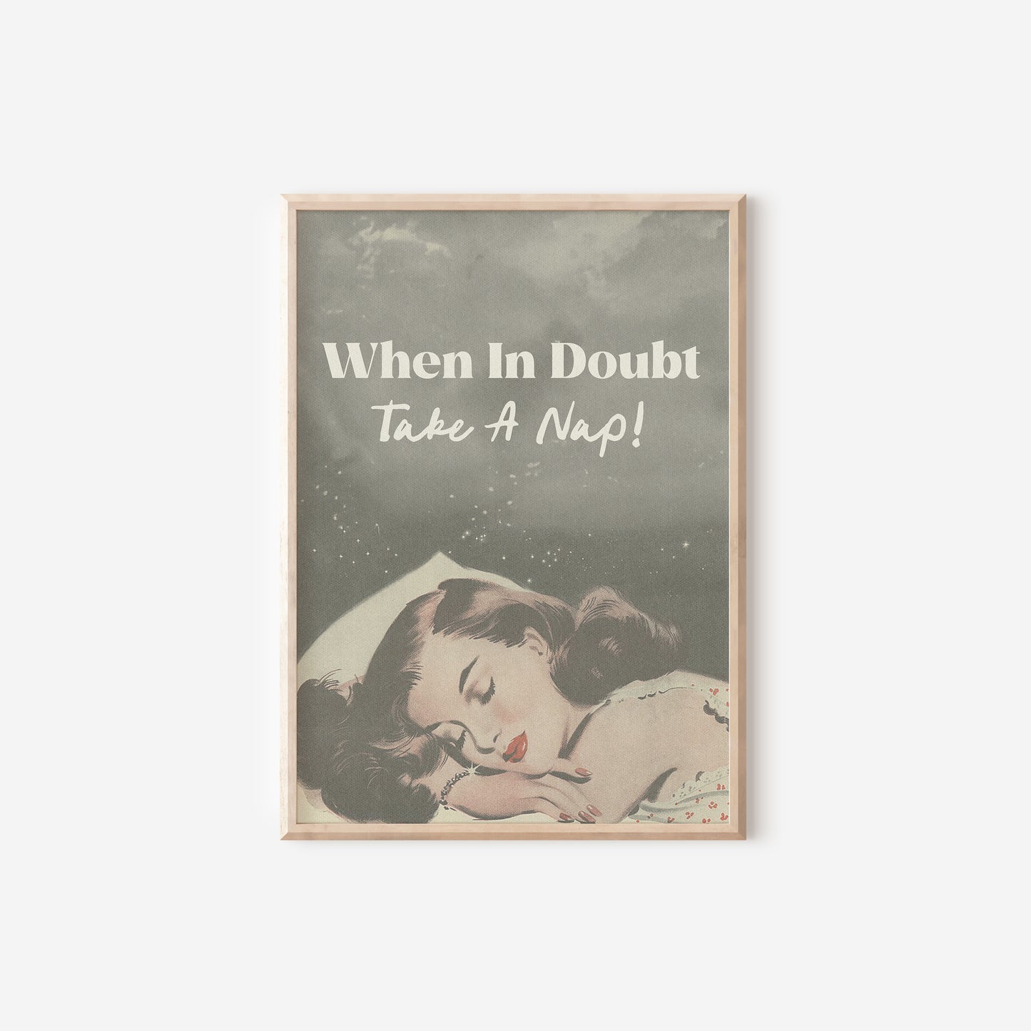 a poster with a woman sleeping on top of a bed