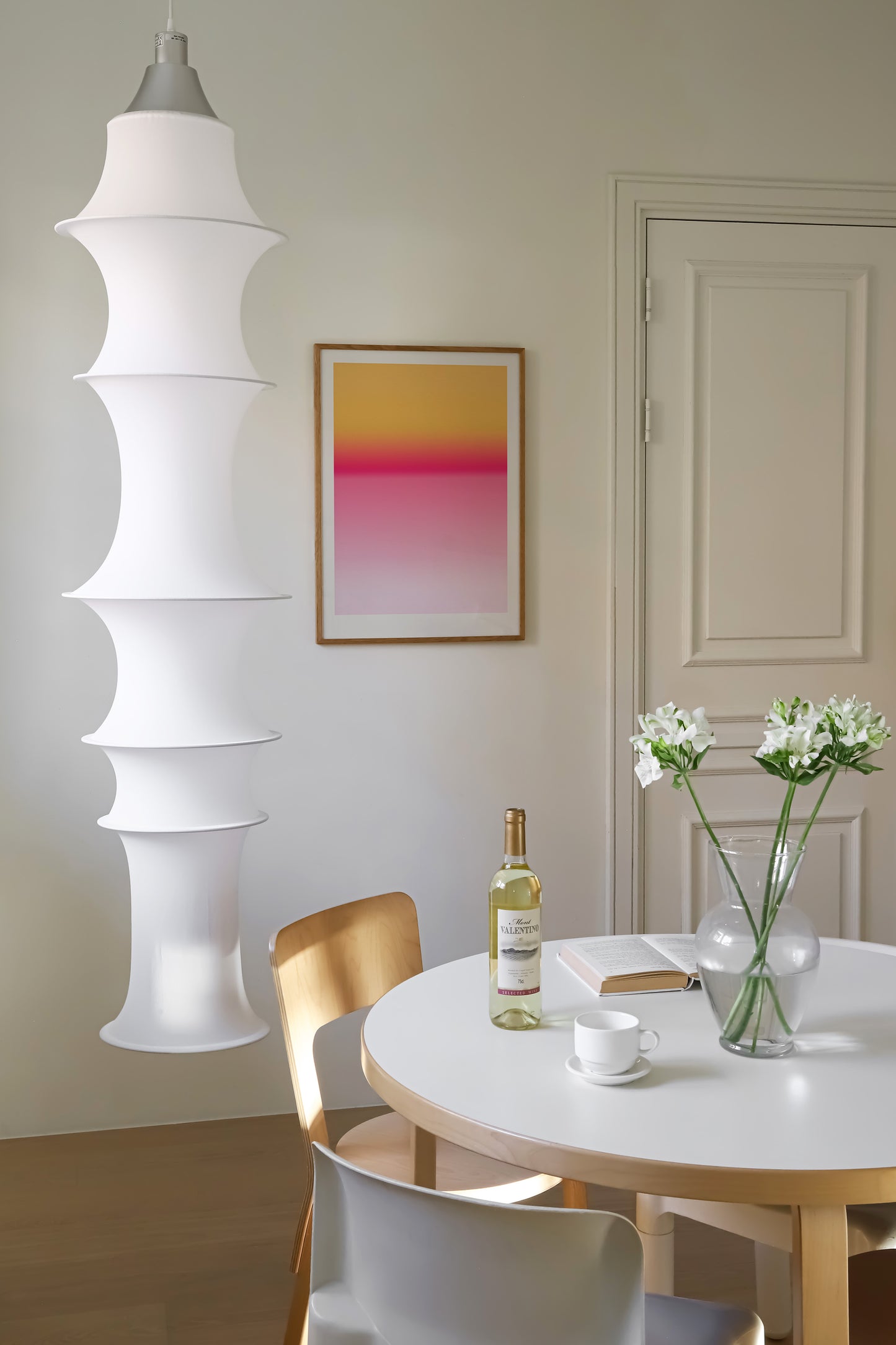 a white table and chairs in a room