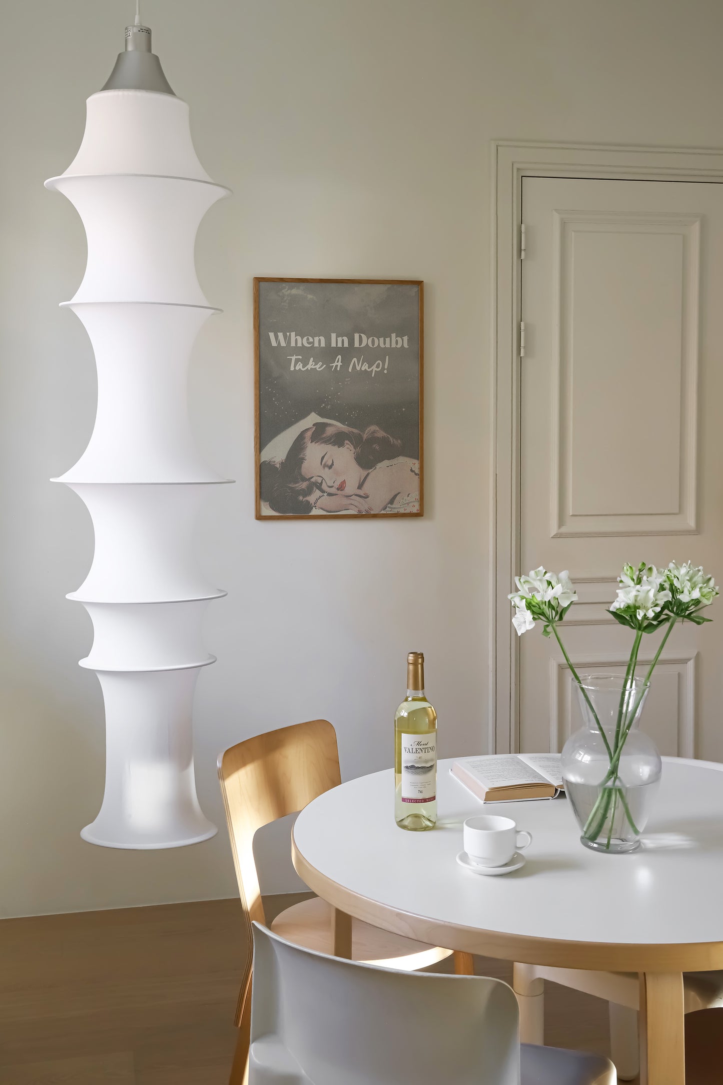 a white table and chairs in a room