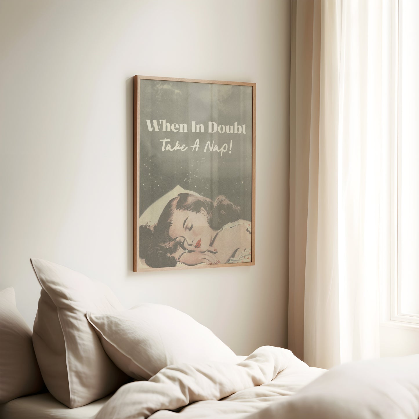 a poster hanging on a wall above a bed