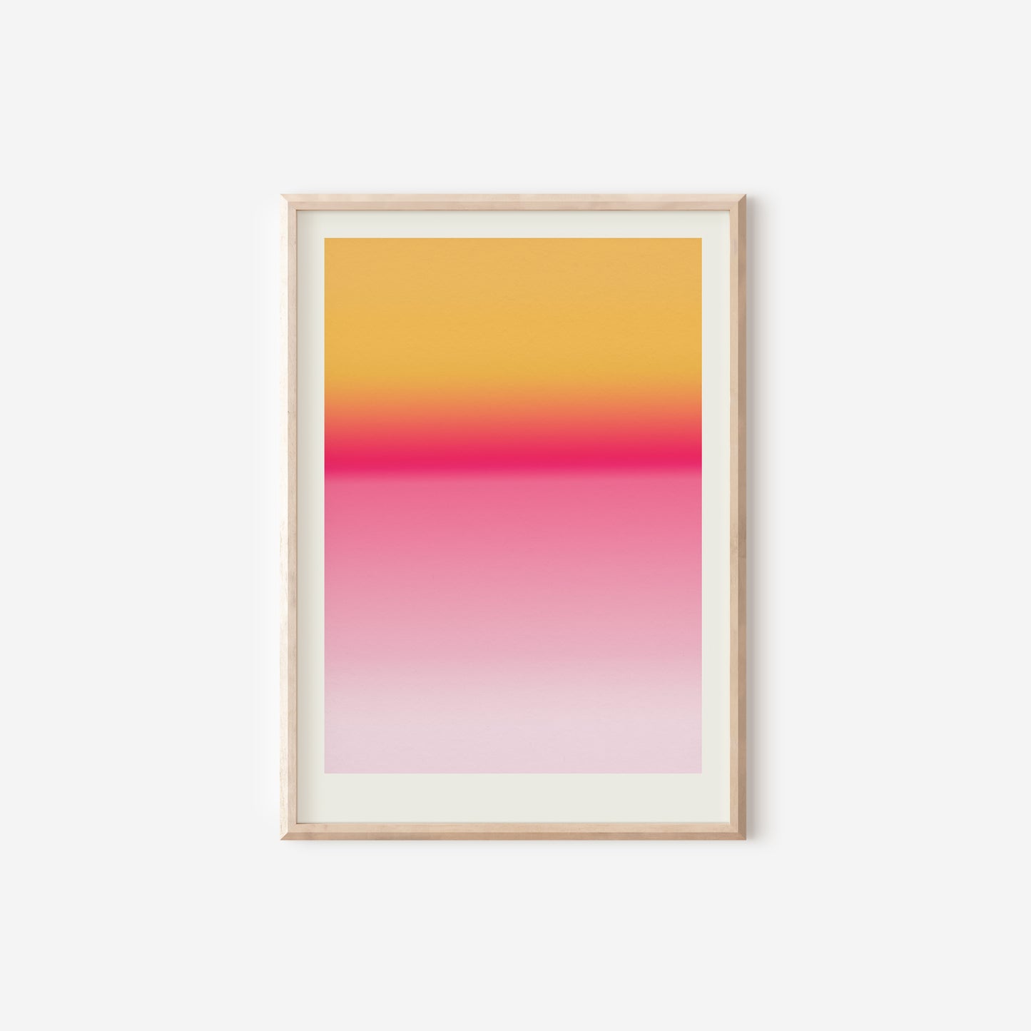 a pink and yellow poster hanging on a wall