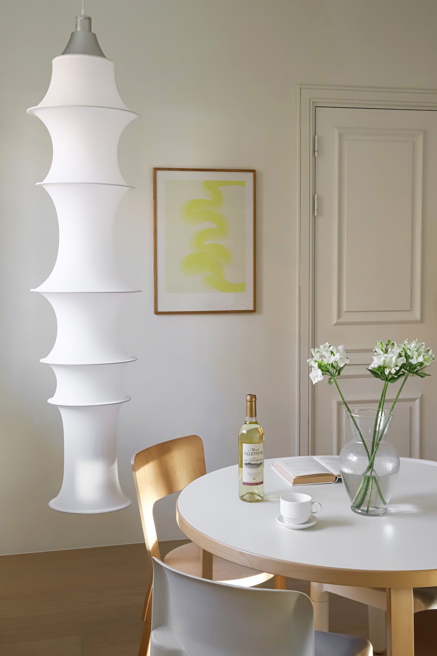a white table and chairs in a room