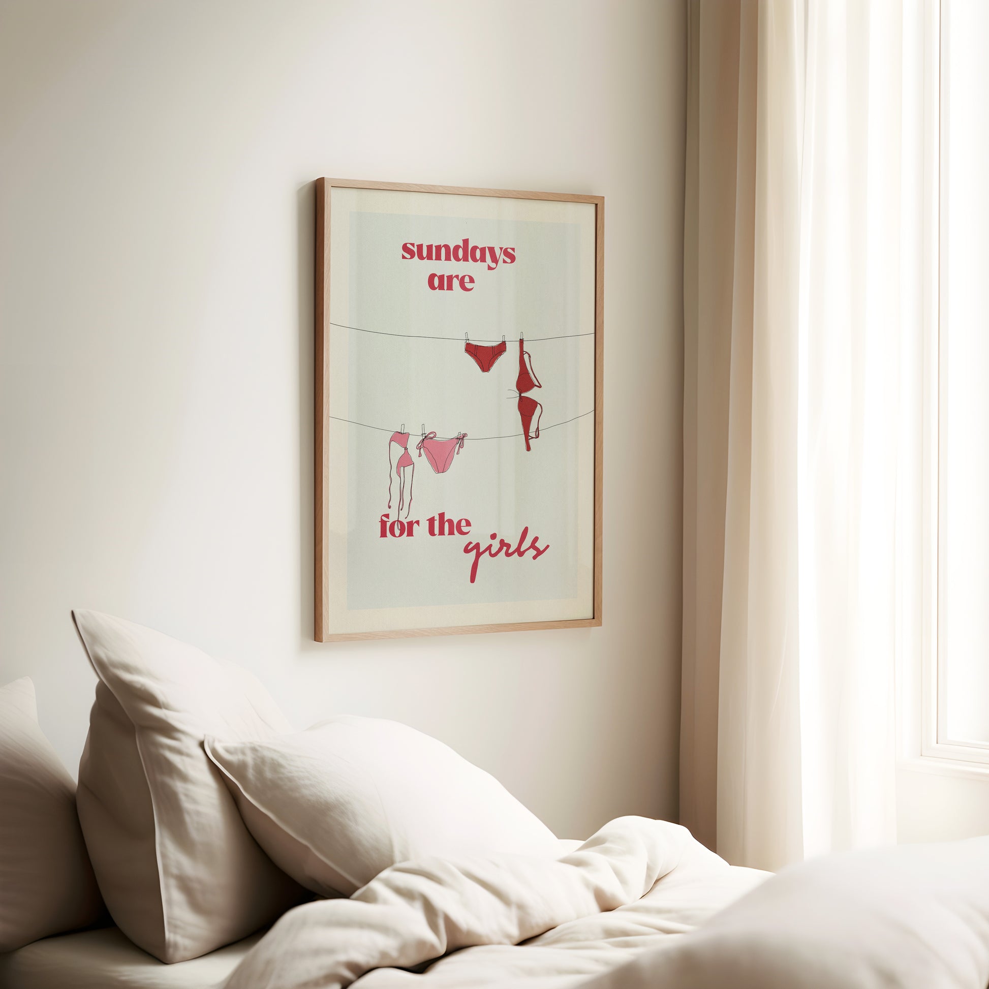 a bed with a white comforter and a picture on the wall