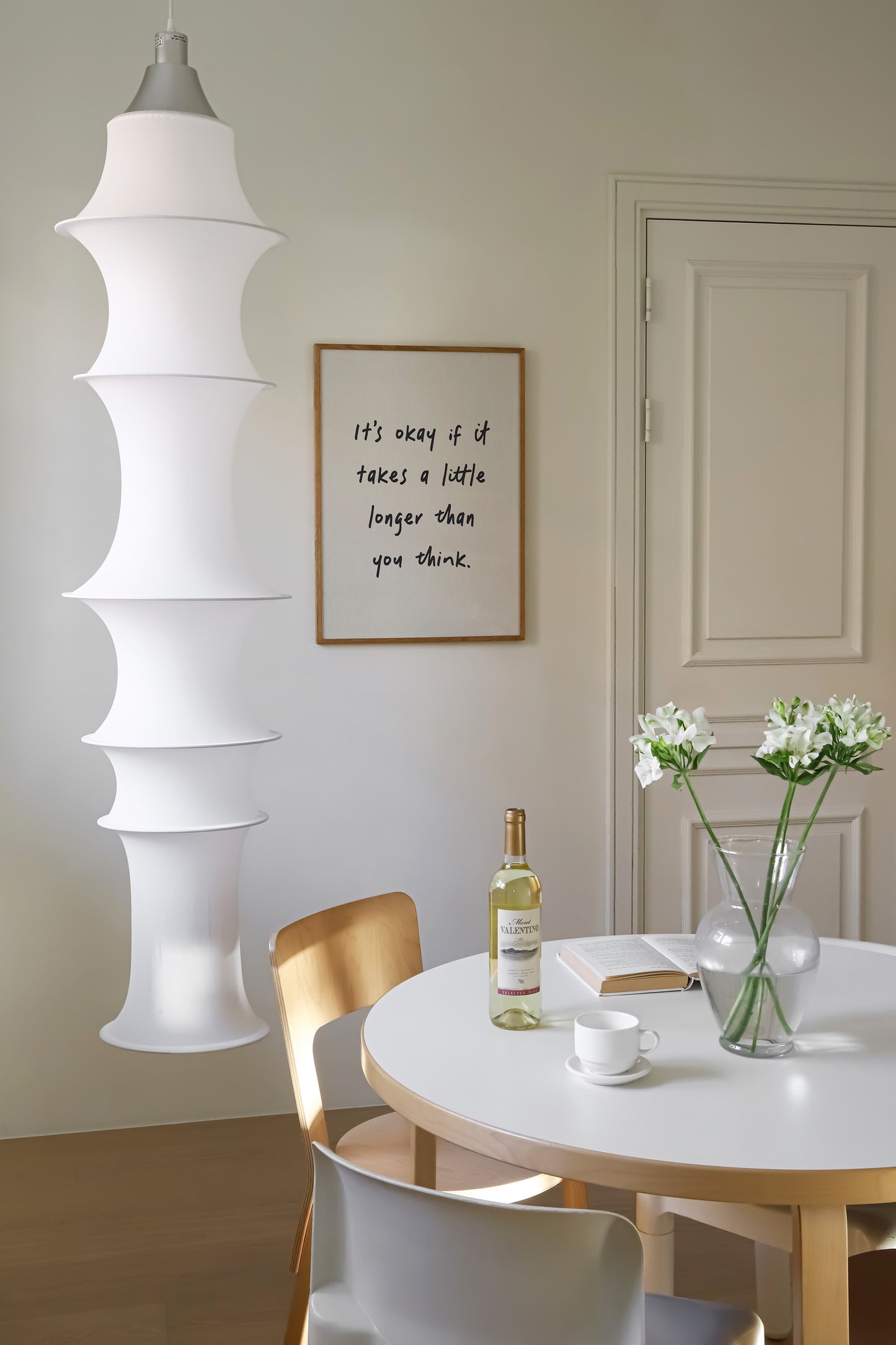 a white table and chairs in a room