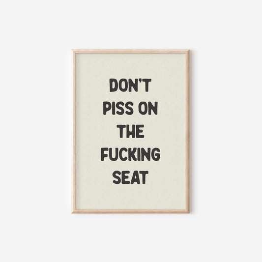 a black and white poster with the words don't piss on the fucking seat