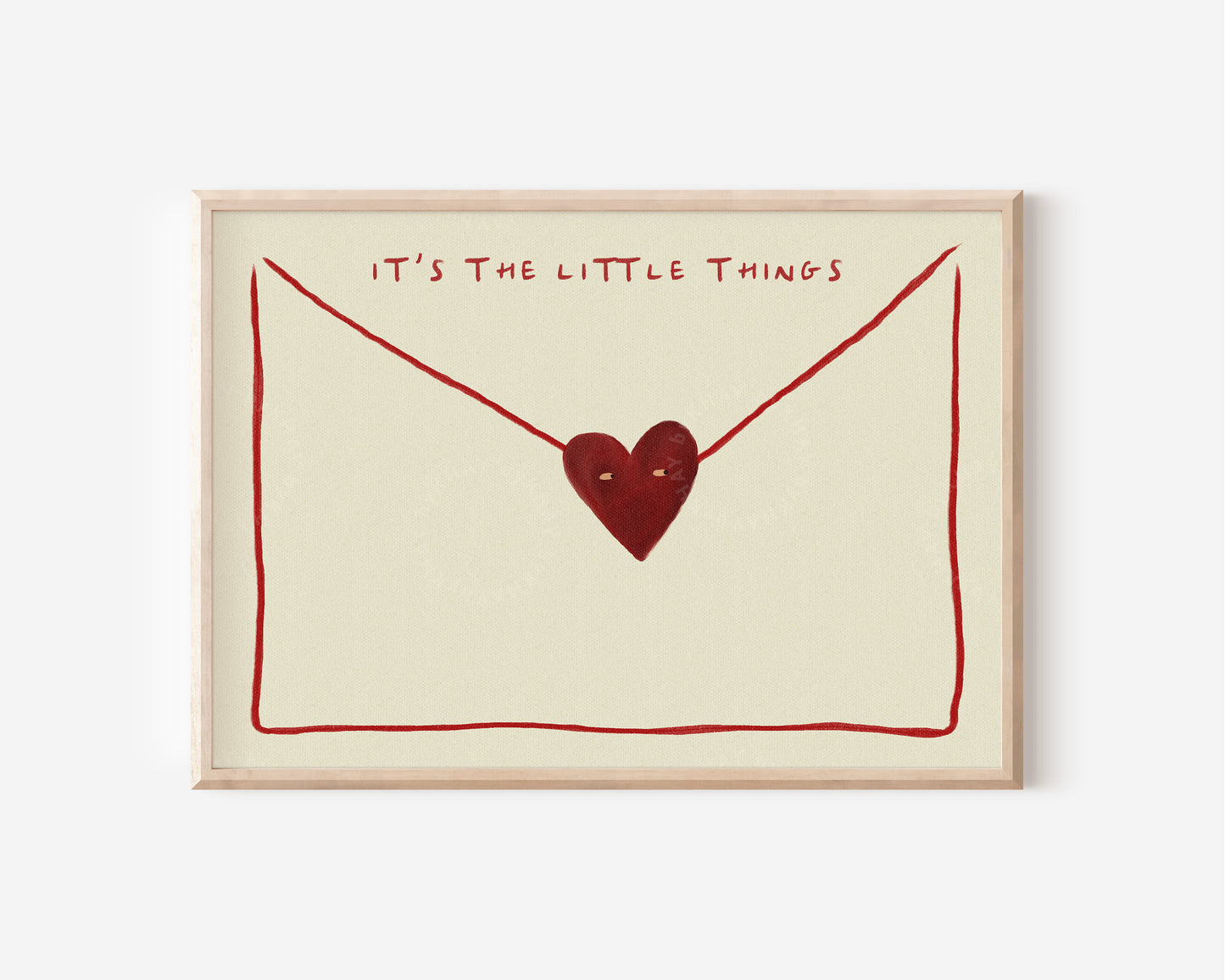 The image is a framed print with a heart-shaped symbol and the text "IT'S THE LITTLE THINGS" written above it.