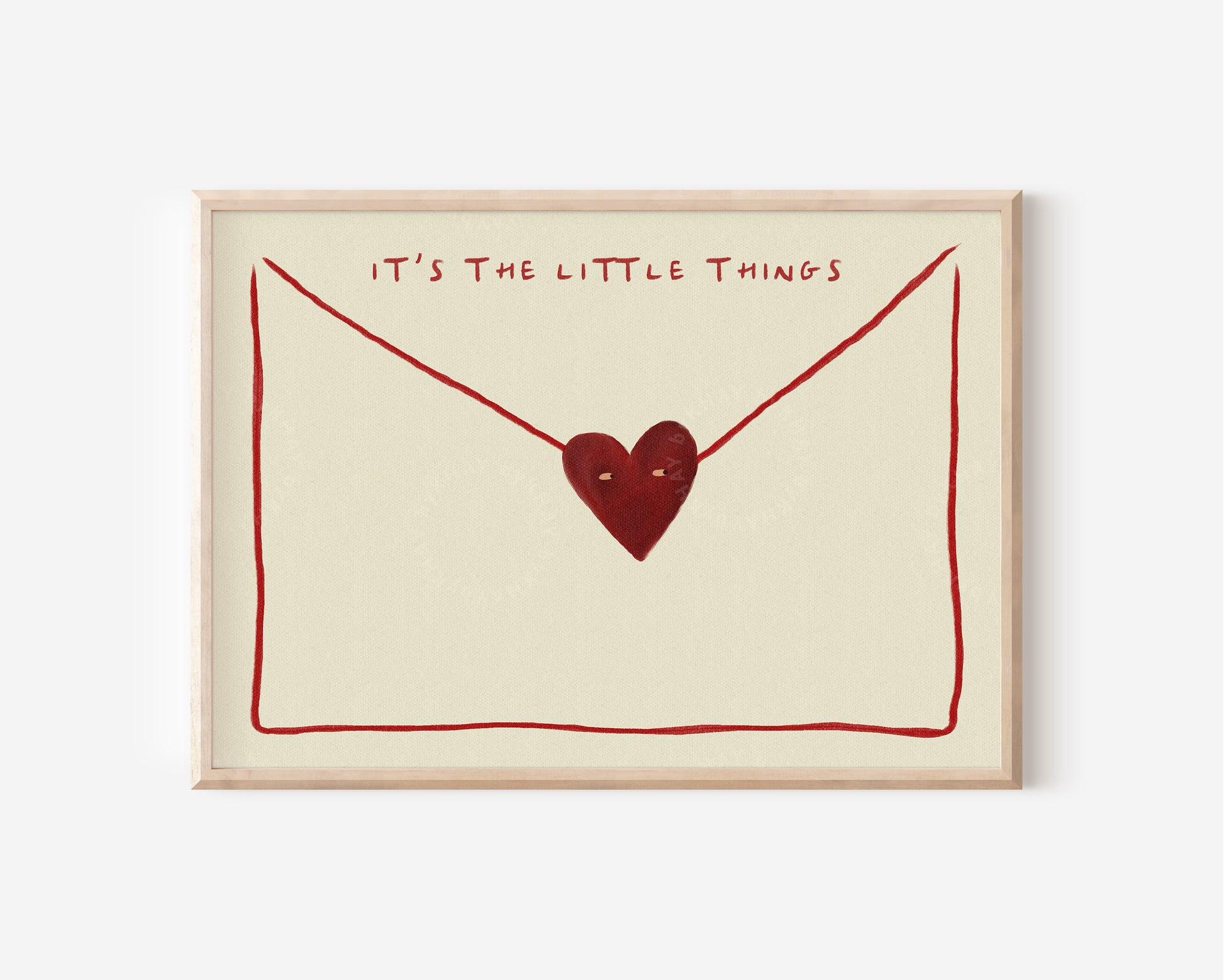 The image is a framed print with a heart-shaped symbol and the text "IT'S THE LITTLE THINGS" written above it.
