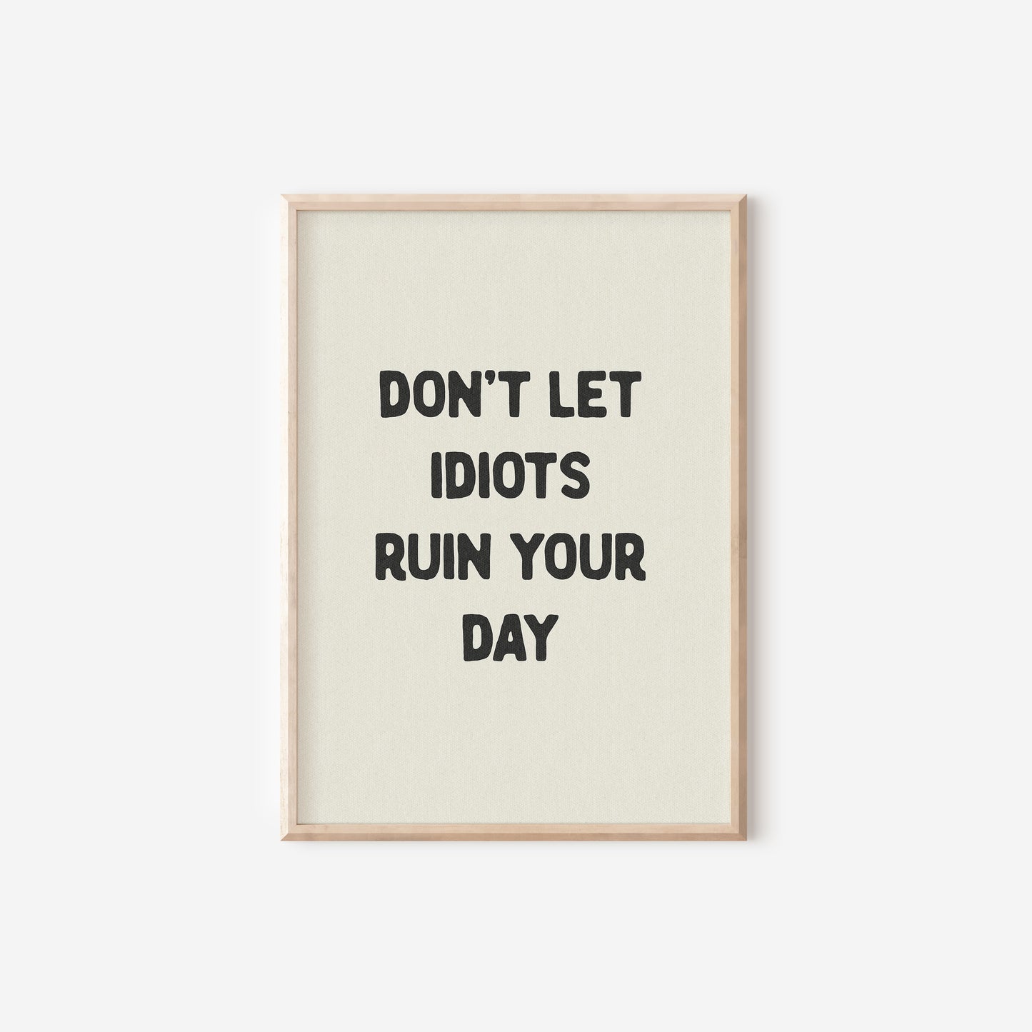 a black and white poster with the words don't let idiots ruin your day