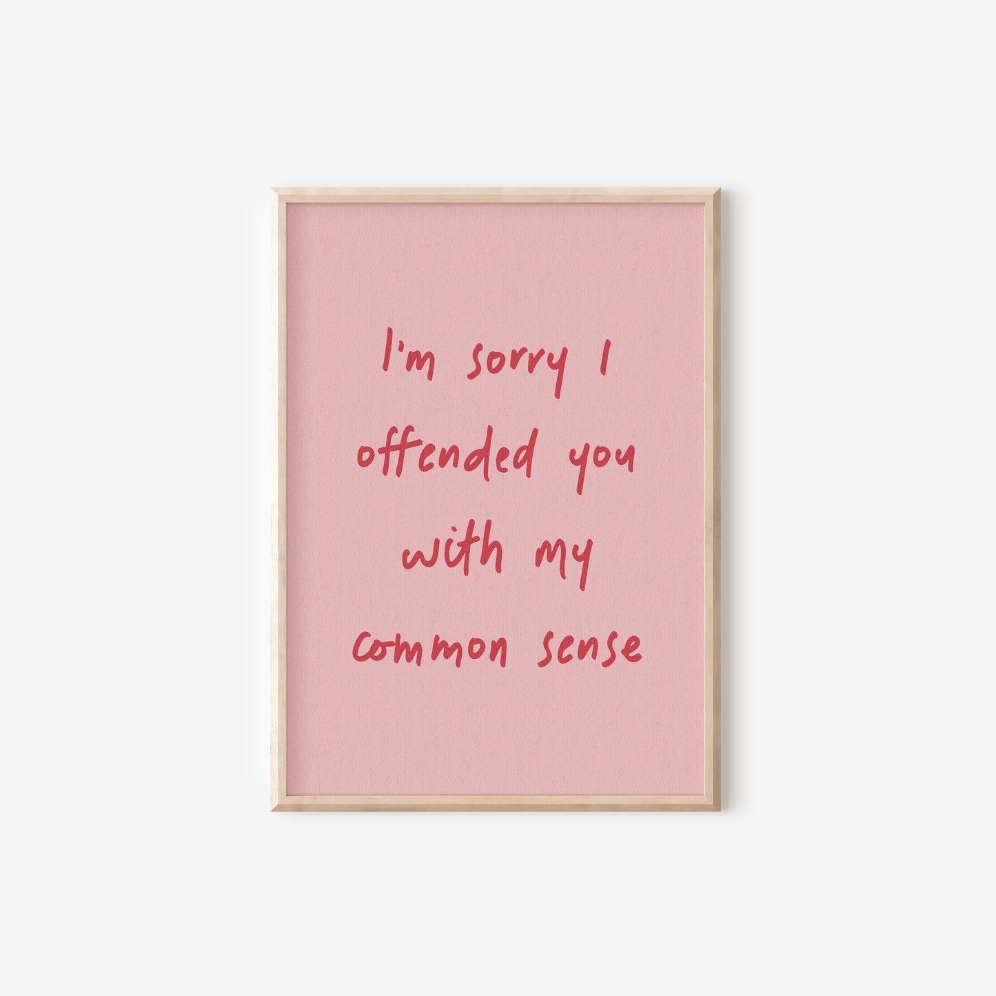 a pink poster with a red writing on it that says i'm sorry i