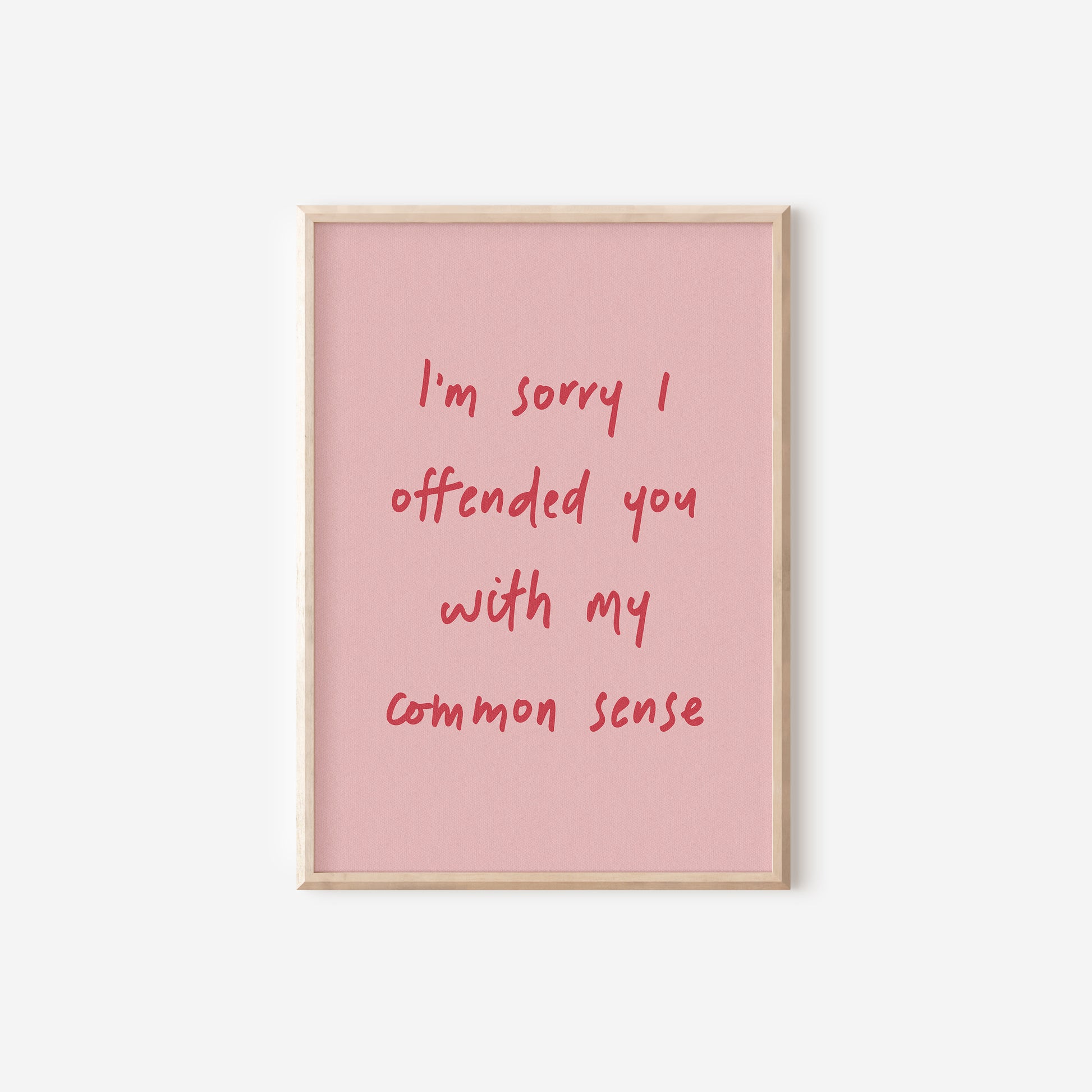 a pink poster with a red writing on it that says i'm sorry i