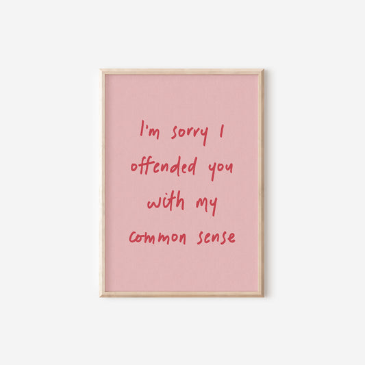 a pink poster with a red writing on it that says i'm sorry i