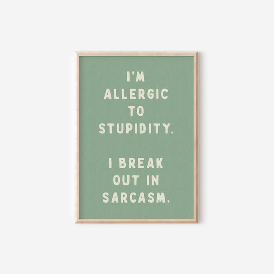 a green poster with the words i'm allergic to stupidity,